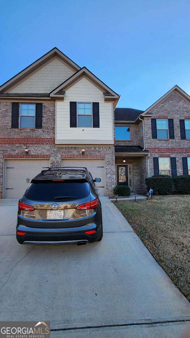 view of property featuring a garage