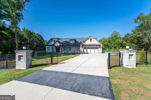 view of front of home featuring a garage and a front lawn