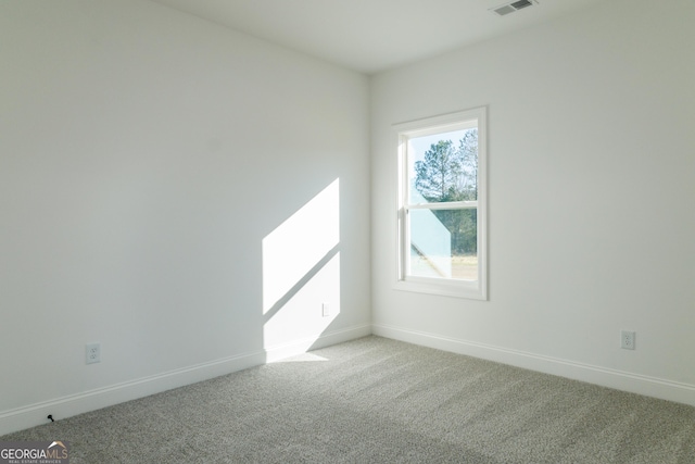 184 Grove Park Unit 11, Senoia, GA 30276 - empty room with light colored carpet and baseboards
