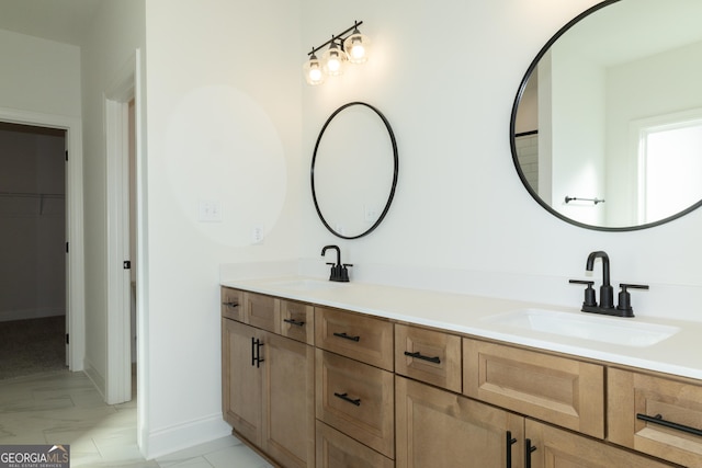 184 Grove Park Unit 11, Senoia, GA 30276 - full bath featuring double vanity, a walk in closet, and baseboards