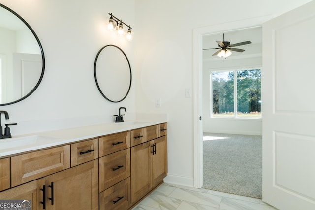 184 Grove Park Unit 11, Senoia, GA 30276 - bathroom featuring double vanity, a ceiling fan, baseboards, and marble finish flooring