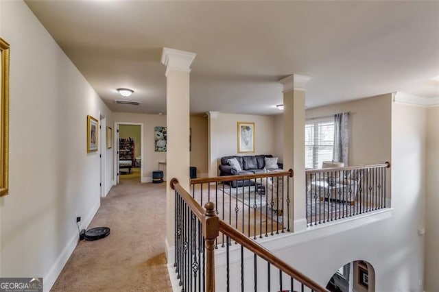 hallway featuring light carpet