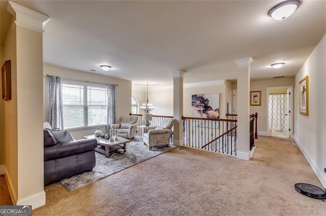 carpeted living room with a notable chandelier and ornamental molding