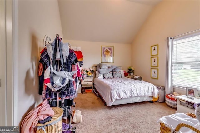 carpeted bedroom with vaulted ceiling and multiple windows