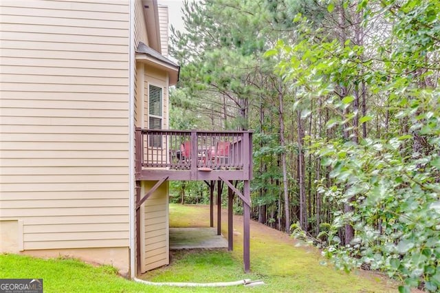 view of yard featuring a deck