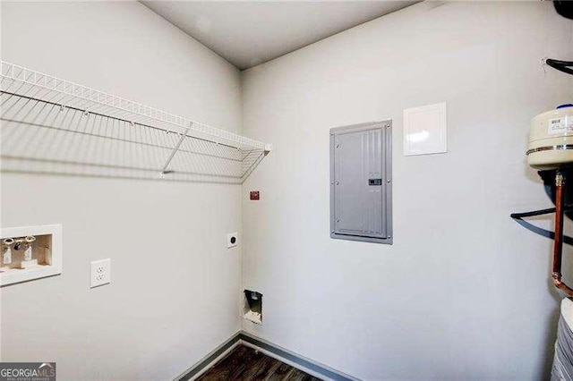 clothes washing area featuring washer hookup, electric panel, electric dryer hookup, and hardwood / wood-style floors