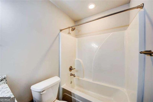 full bathroom featuring vanity, shower / bathtub combination, and toilet