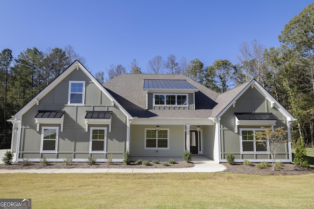 view of front of property with a front lawn