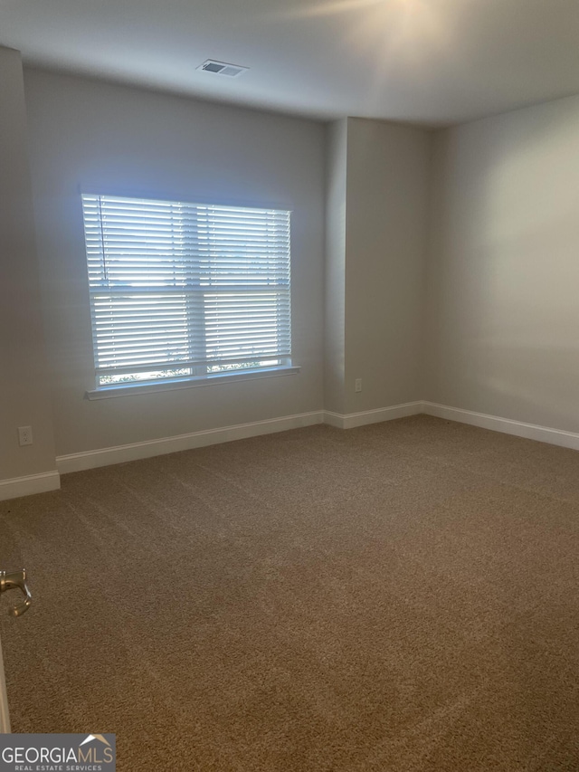 view of carpeted empty room