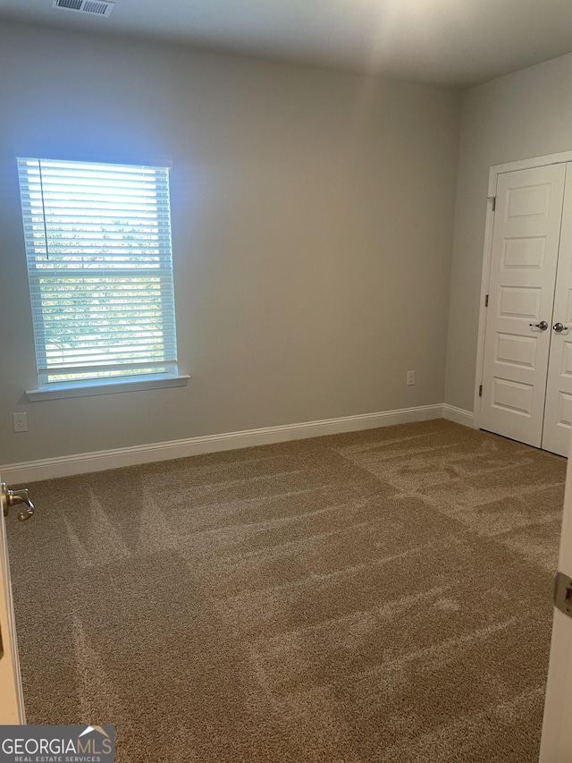 view of carpeted empty room