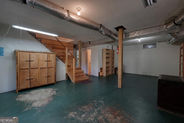 basement with a textured ceiling