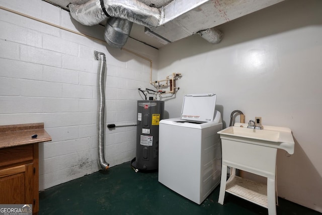 washroom featuring washer / dryer, electric water heater, and sink