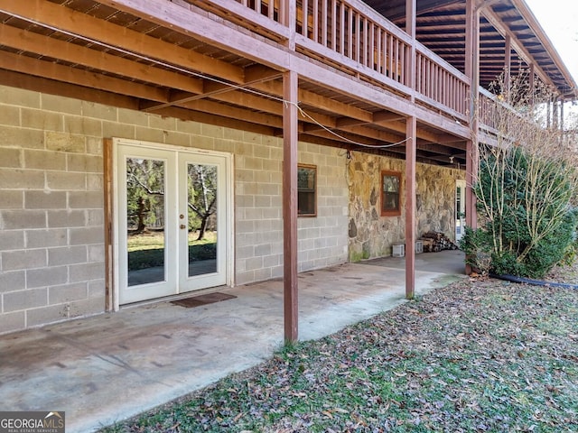 view of patio / terrace featuring french doors and a deck