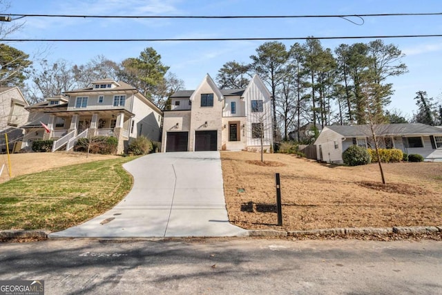 view of front of home with a porch, a garage, and a front yard