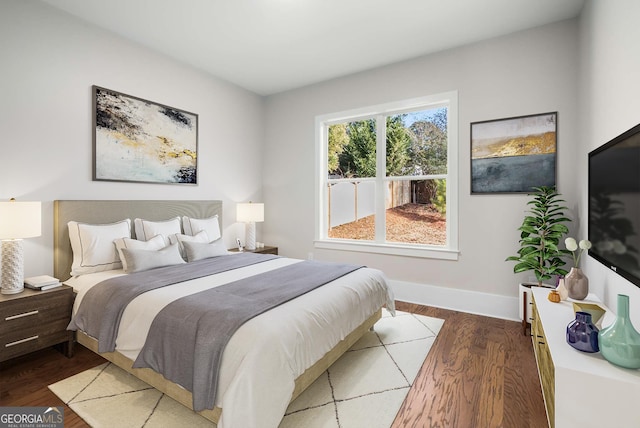 bedroom featuring dark hardwood / wood-style floors