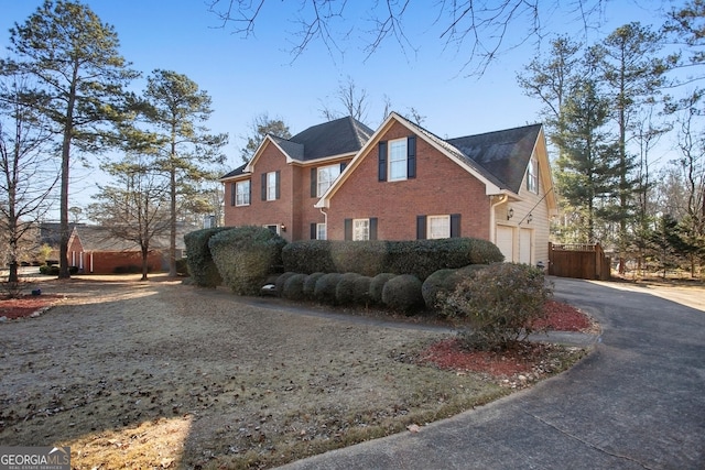 view of home's exterior featuring a garage