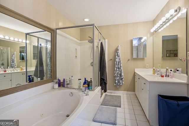 bathroom featuring tile patterned floors, vanity, and separate shower and tub