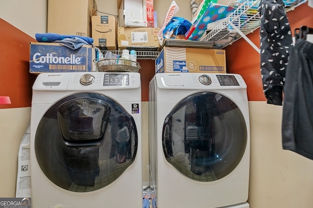 washroom with washer and clothes dryer