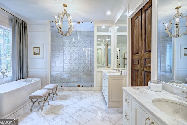 bathroom featuring ornamental molding, vanity, shower with separate bathtub, and a notable chandelier