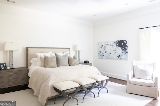 bedroom with light wood-type flooring