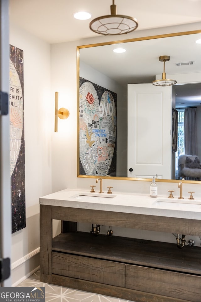 bathroom with vanity and tile patterned flooring