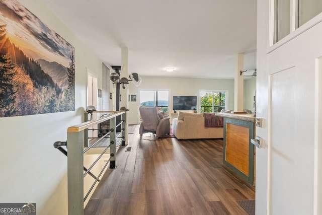 interior space with dark wood-type flooring