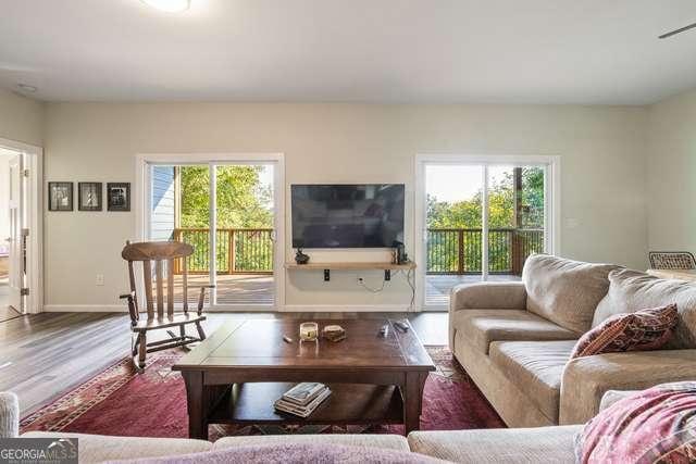 living room with wood-type flooring