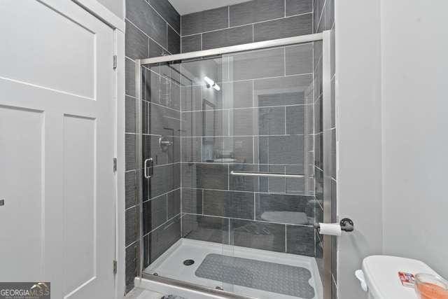 bathroom with walk in shower