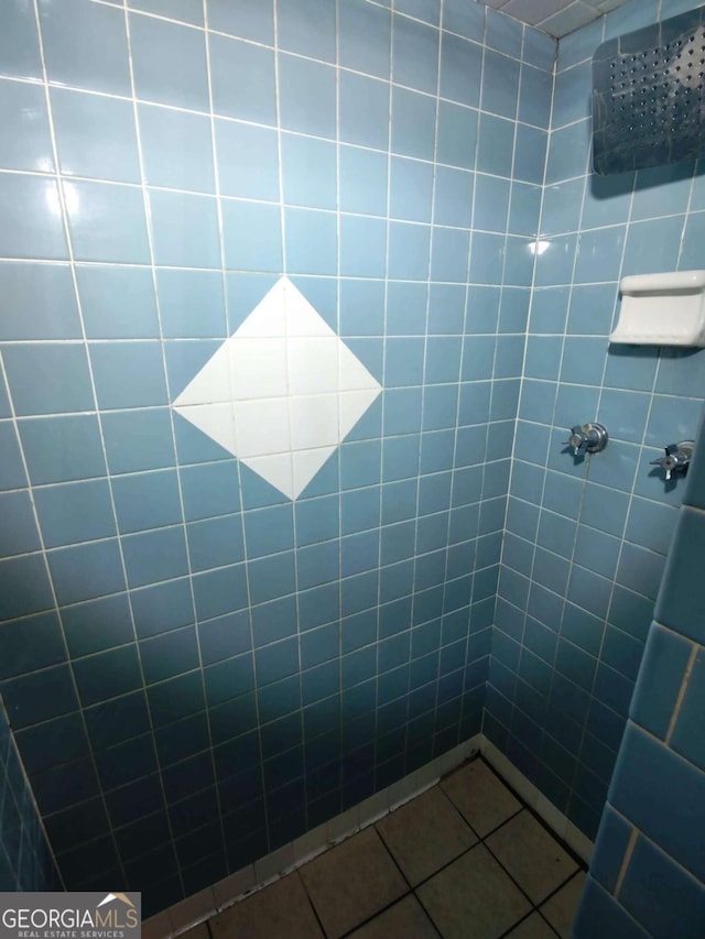 bathroom featuring tile patterned floors and walk in shower