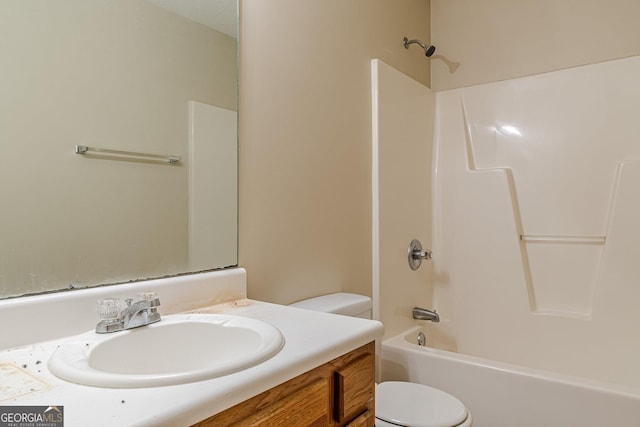 full bathroom featuring vanity, toilet, and shower / bath combination