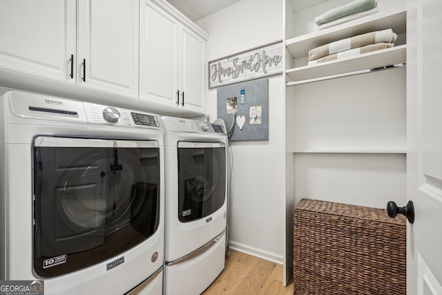 475 Rose Garden Ln, Alpharetta, GA 30009 - laundry area with independent washer and dryer, light wood finished floors, and cabinet space