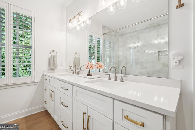 475 Rose Garden Ln, Alpharetta, GA 30009 - full bath featuring double vanity, tiled shower, and wood finished floors
