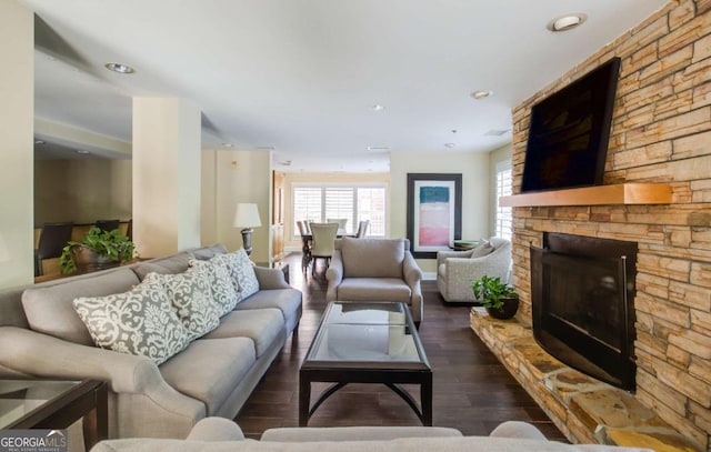 50 Biscayne Dr Unit 2109, Atlanta, GA 30309 - living area with a fireplace and dark wood-style floors
