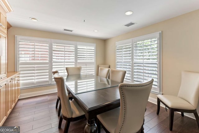 50 Biscayne Dr Unit 2109, Atlanta, GA 30309 - dining area with baseboards, dark wood finished floors, and recessed lighting
