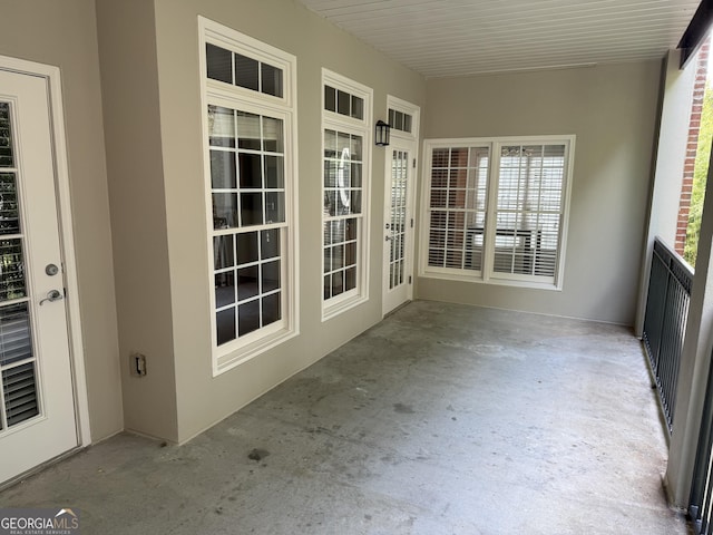 50 Biscayne Dr Unit 2109, Atlanta, GA 30309 - unfurnished sunroom featuring unfinished concrete flooring