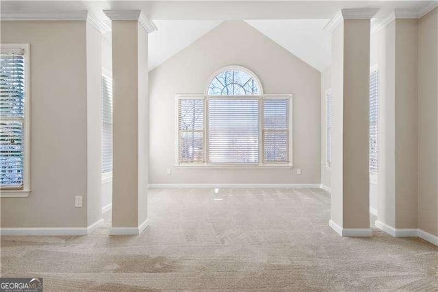 interior space featuring vaulted ceiling and ornamental molding