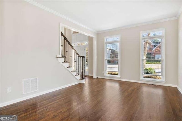 interior space with dark wood-type flooring and crown molding