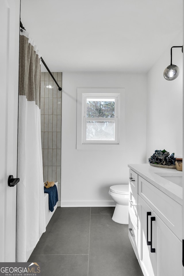 full bathroom with toilet, shower / bathtub combination with curtain, and vanity