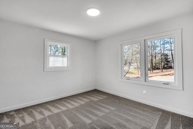 unfurnished room featuring carpet floors