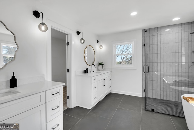 bathroom featuring vanity, tile patterned floors, and an enclosed shower