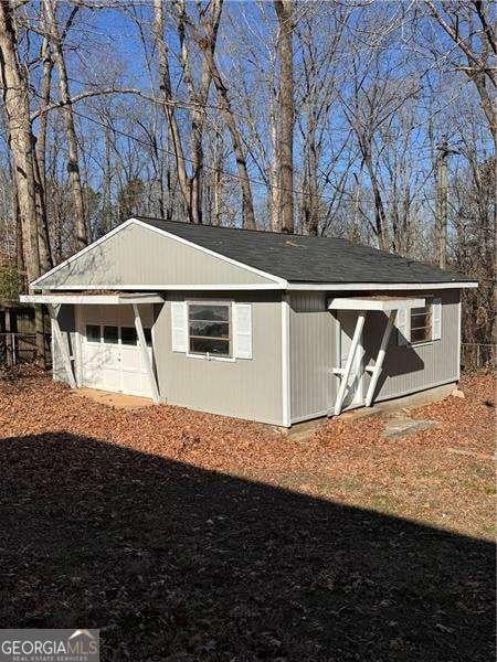 view of outbuilding with a garage