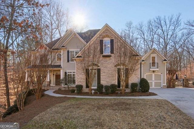 view of front of home featuring a garage and a front lawn