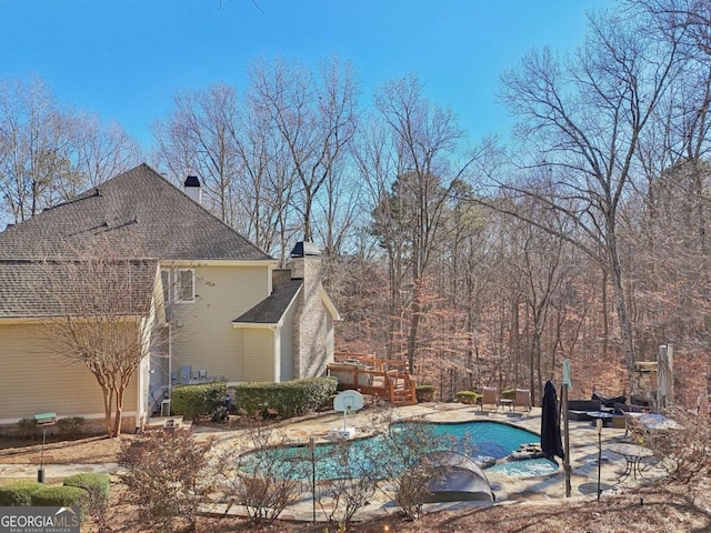 view of pool featuring a patio area