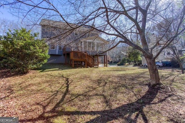 view of yard with a deck