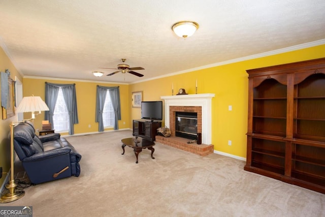 living room with crown molding, ceiling fan, a textured ceiling, light carpet, and a brick fireplace