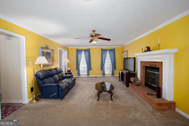 living room with crown molding, a brick fireplace, a textured ceiling, ceiling fan, and light colored carpet