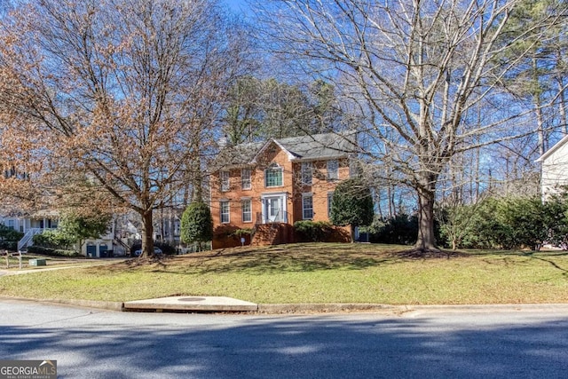 view of front of home featuring a front yard