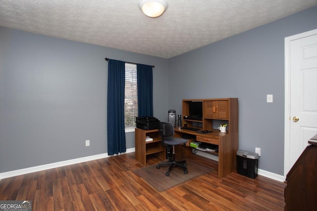 office space with dark hardwood / wood-style flooring and a textured ceiling