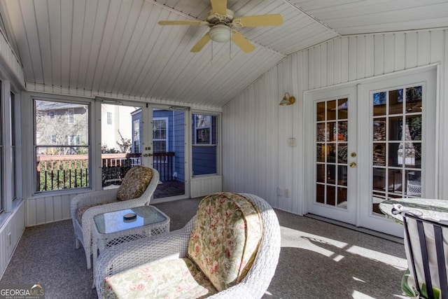 sunroom featuring french doors, ceiling fan, and lofted ceiling