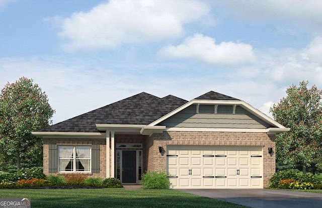 view of front of property with a garage and a front lawn